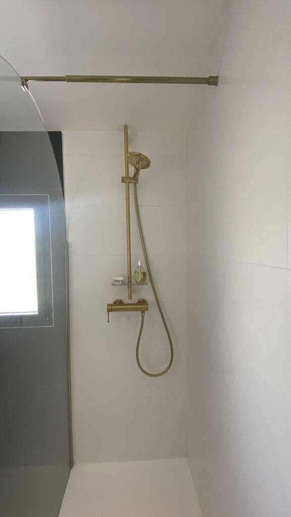 douche laiton paroi verre arrondi